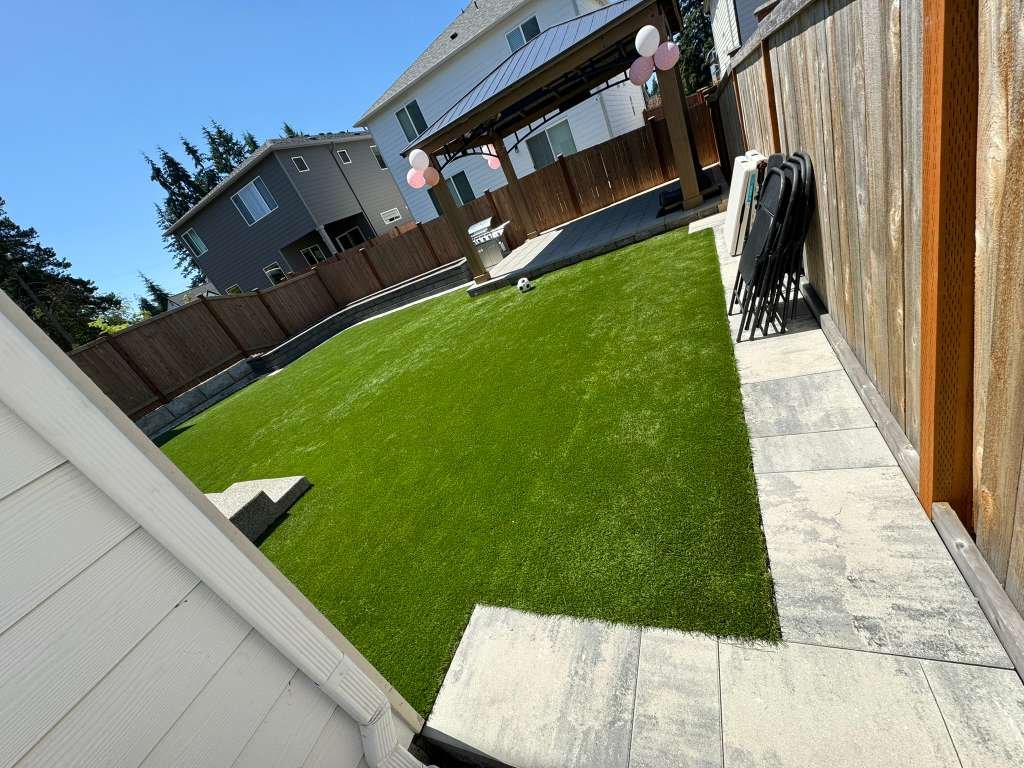 Artificial turf landscaping project by EML Outdoor Service LLC