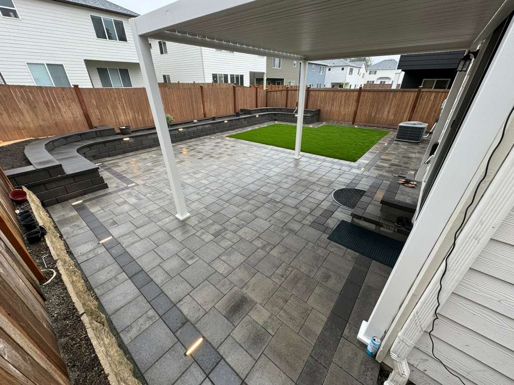 Backyard landscaping project by EML Outdoor Service LLC